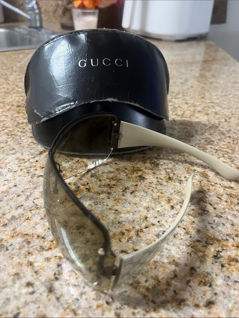 Gucci Rimless Sunglasses with Black Lenses and Cream Arms